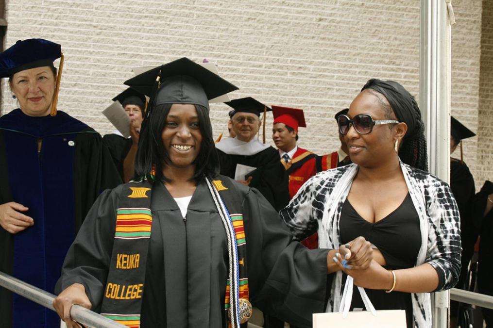 Sociology major Oliesha Jackson usually uses a wheelchair but – to sustained applause – she walked across the stage to accept her diploma at Keuka College's 110th Commencement.